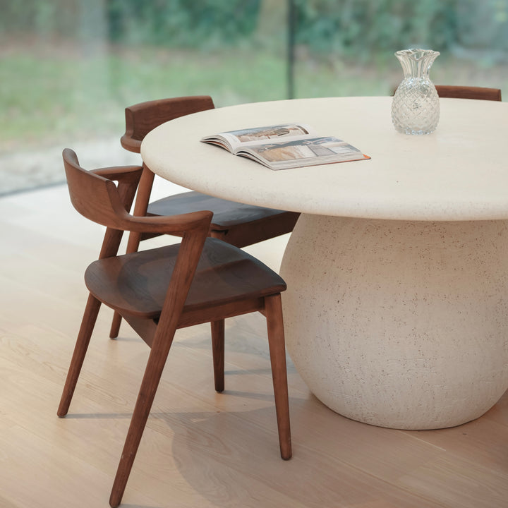 Belgian designer chairs by Mowelli – Jules model in solid wood with armrests and angled legs, styled in minimalistic interior