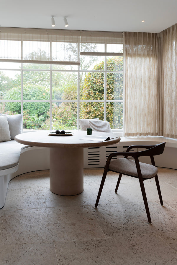 Nora comfort chair by Mowelli – stylish wooden chair in brown walnut with soft upholstered cushion seat, perfect for modern interiors.