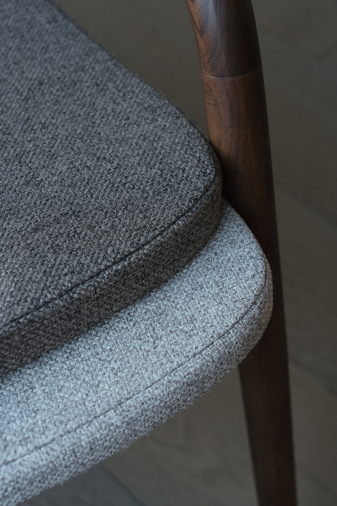 A close-up to show the difference between a mocha brown pillow and a soft greige pillow