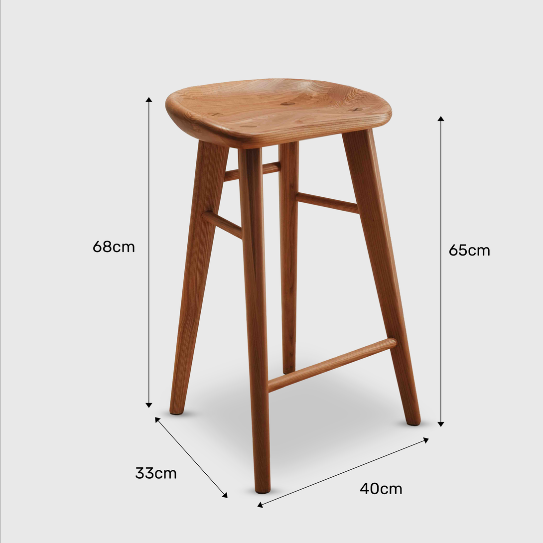 Ollie bar stool iby Mowelli n natural wood with measurements: 68cm tall, 40cm wide, compact and functional.