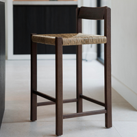 t4option0_0 | leo barstool made of solid hevea wood with handwoven rush seat in rubwood brown at a kitchen island