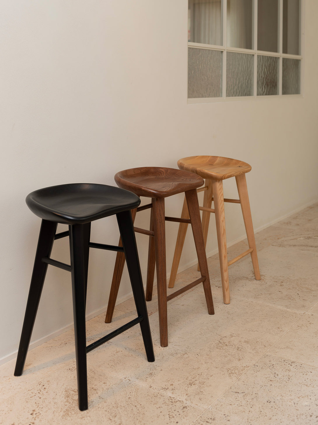 All three version of the ollie bar stool from Mowelli next to each other, comfort and style in a picture.